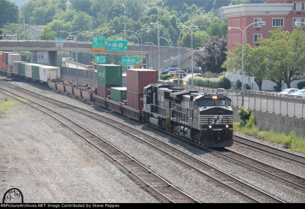 NS 9174 leads a container train through Altoona